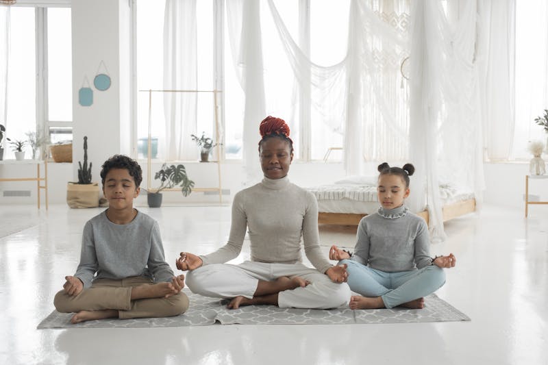 Family practicing mindfulness exercises together. Family health 