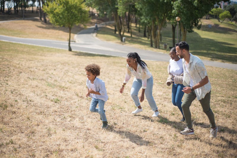 Family enjoying outdoor fitness activities together. Family health 